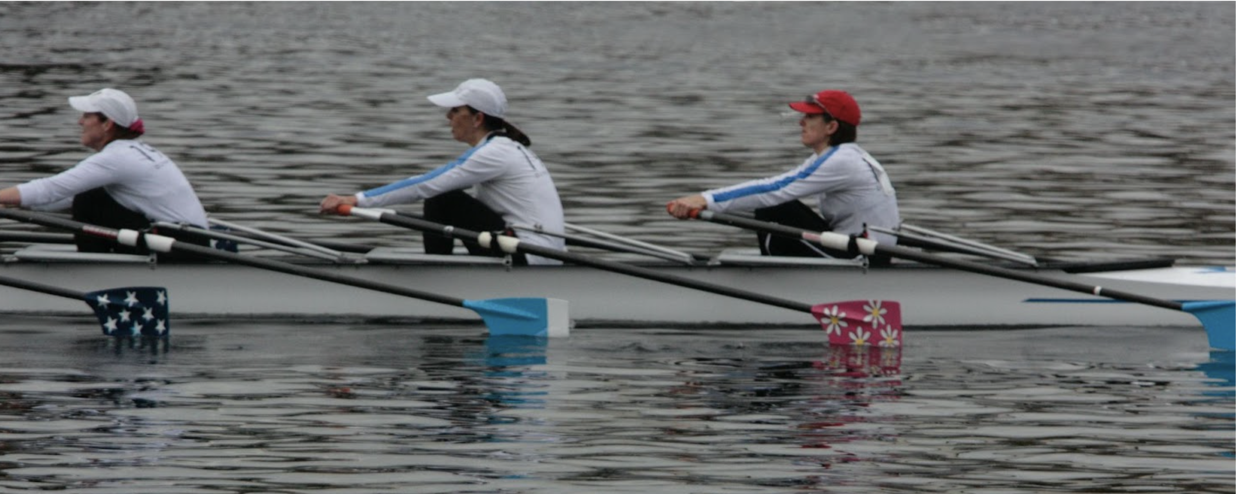 team working together to row